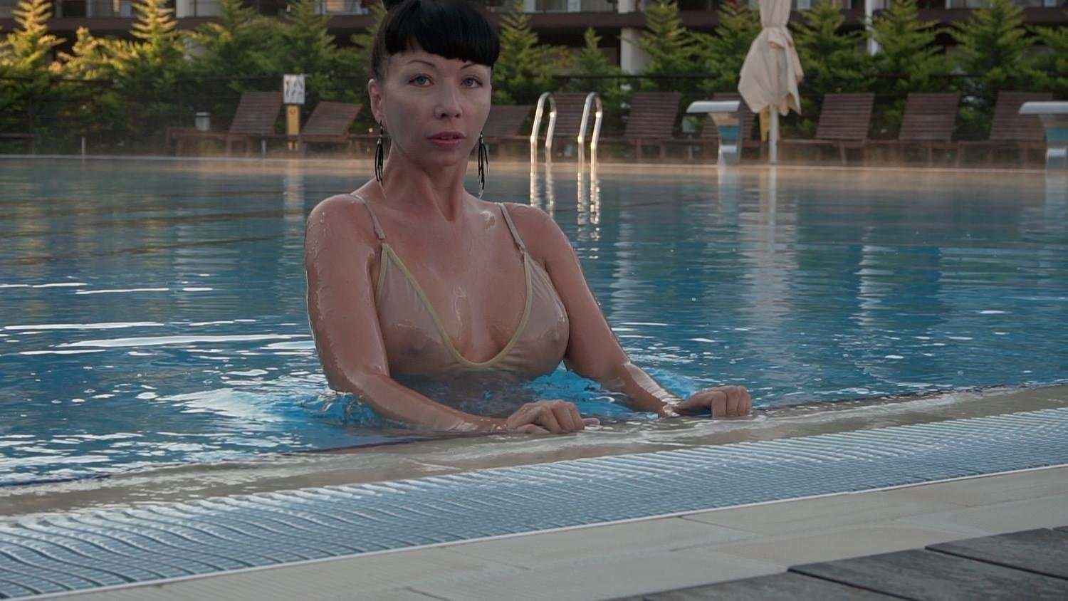 Nude aunty on swimming pool