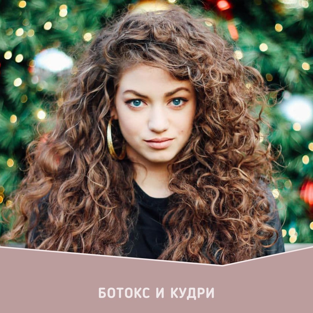 Нарощенные волнистые волосы