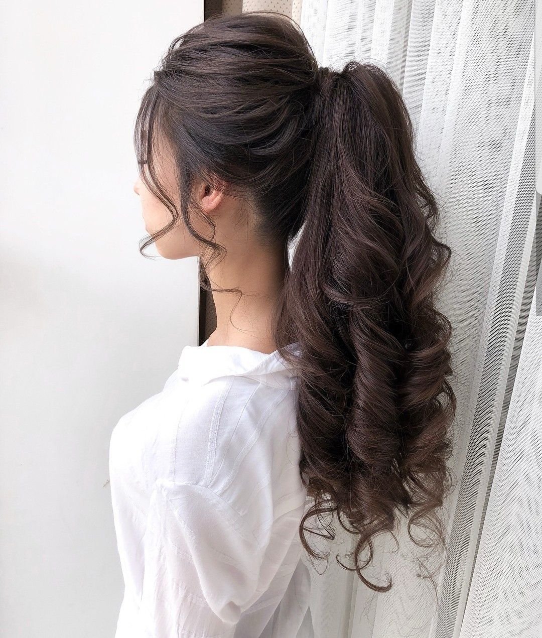 Текстурный хвост на длинные волосы фото