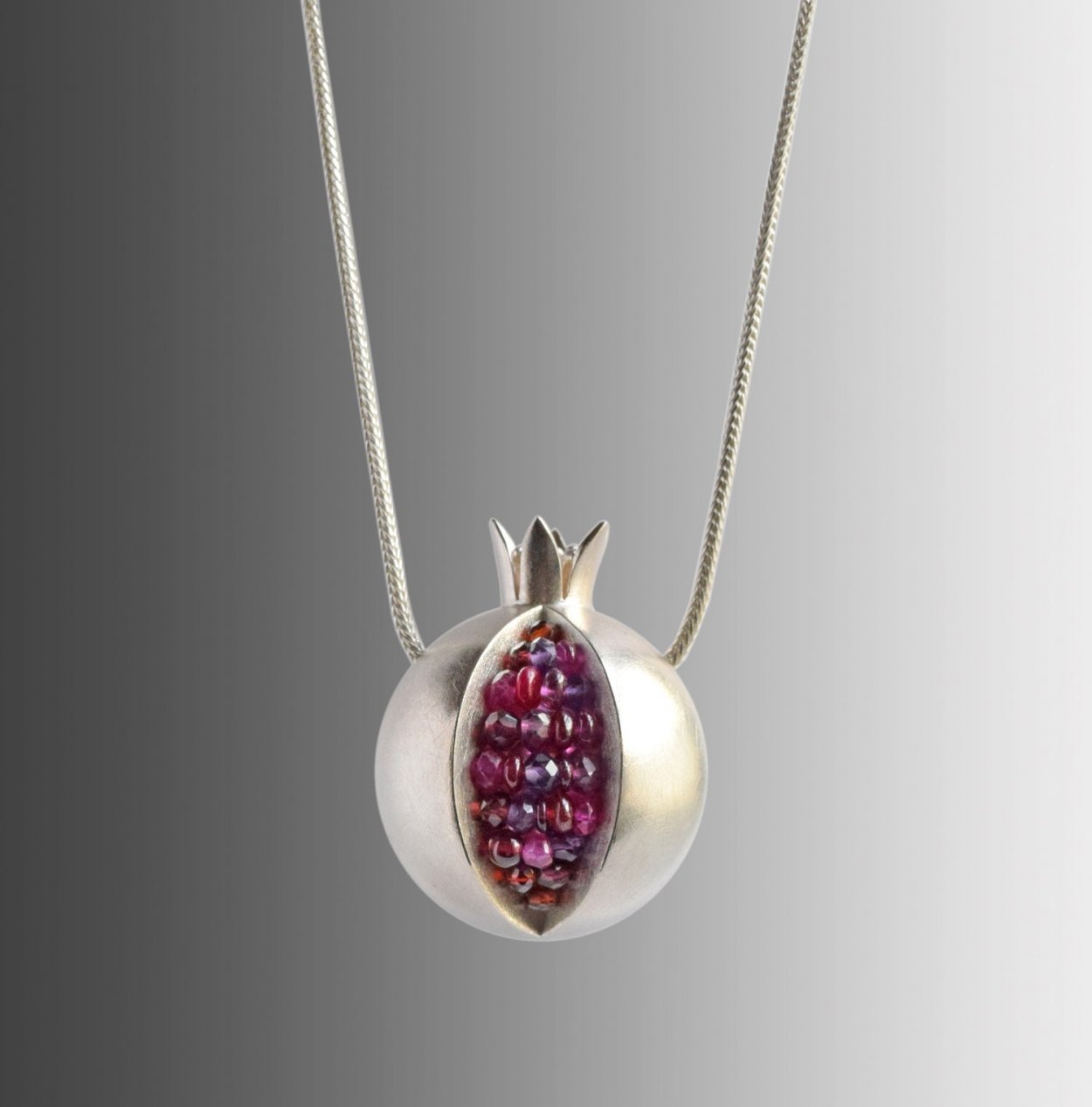 Золотая подвеска Platina Jewelry 03-3142-00-204-1110-57 с гранатом