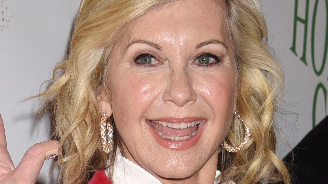 Olivia Newton-John carried away