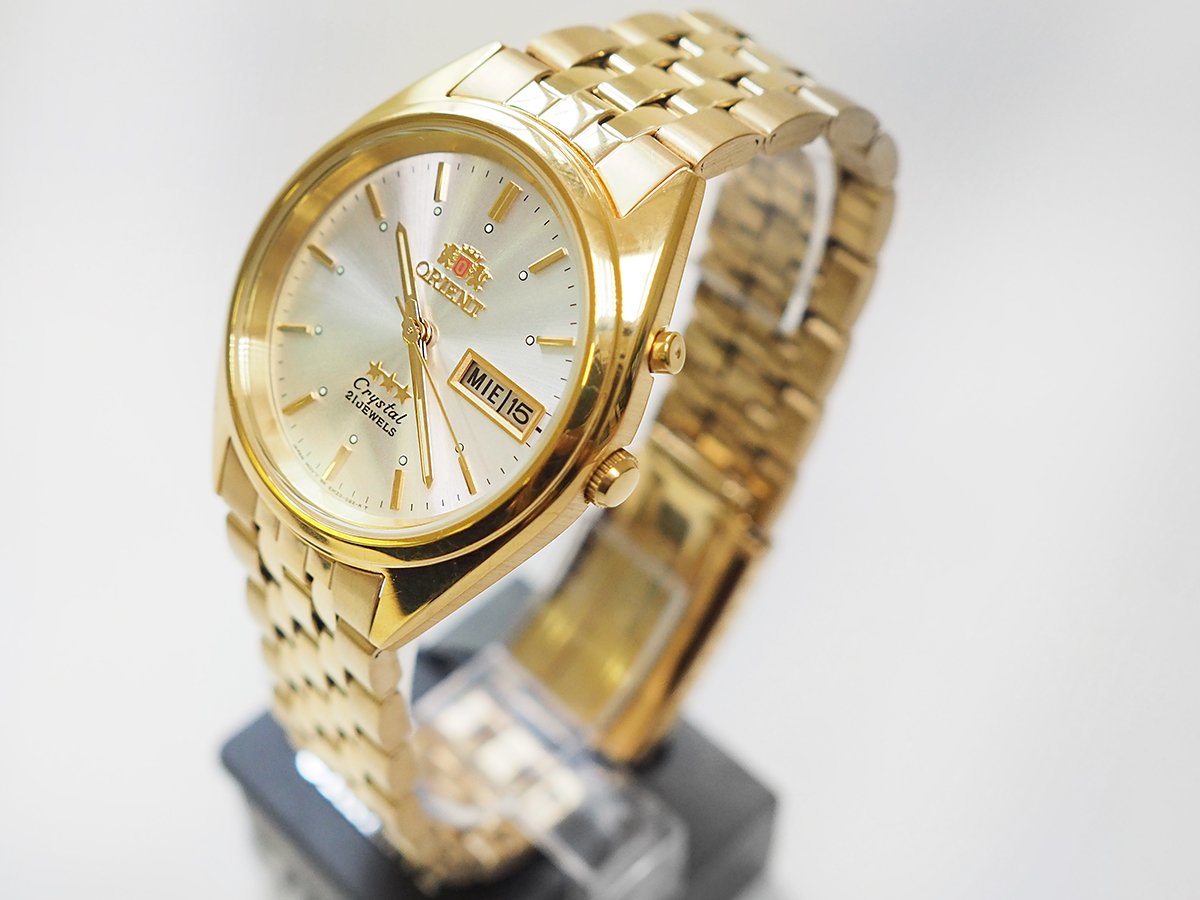 Orient часы золотые