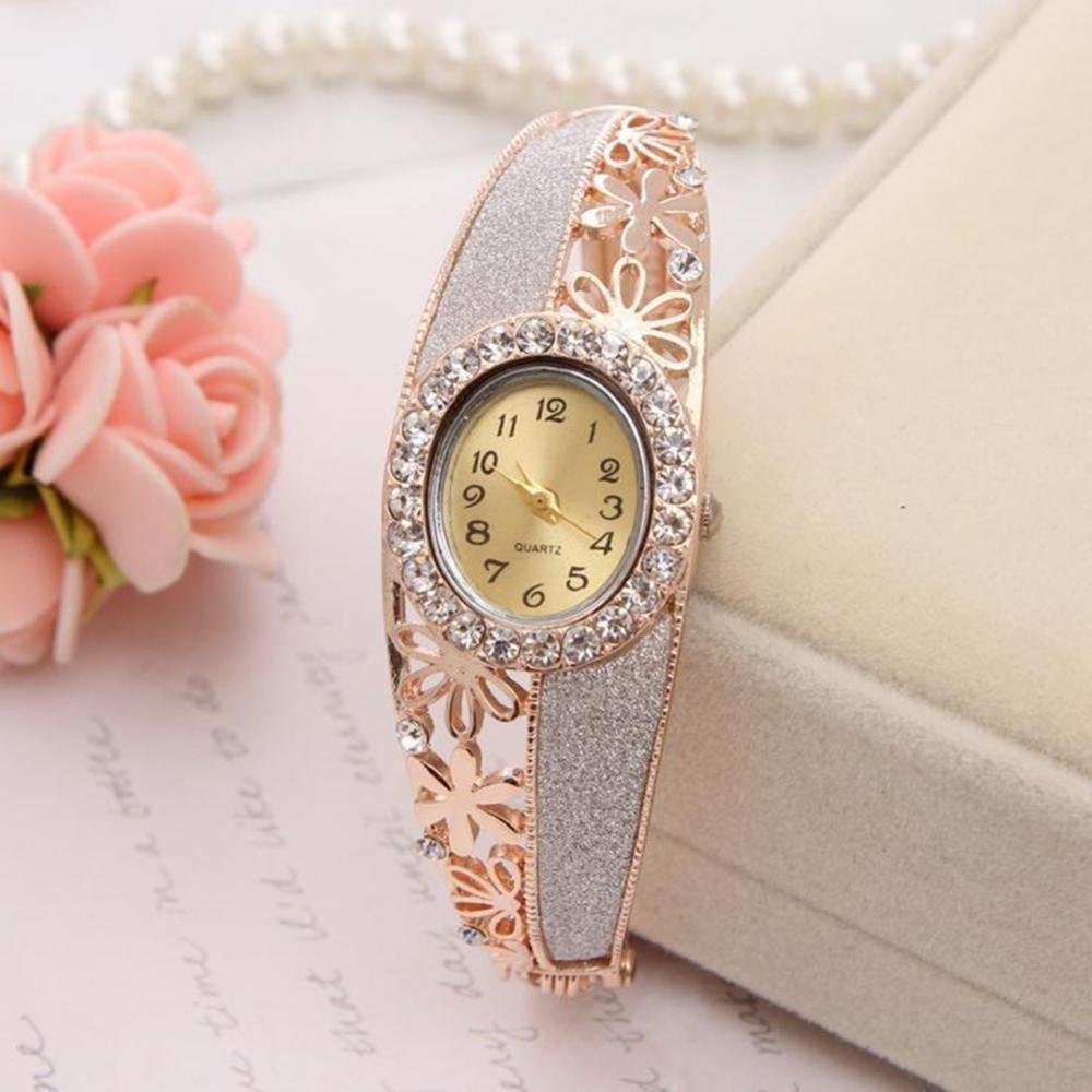 Часы Charm Quartz женские позолоченные