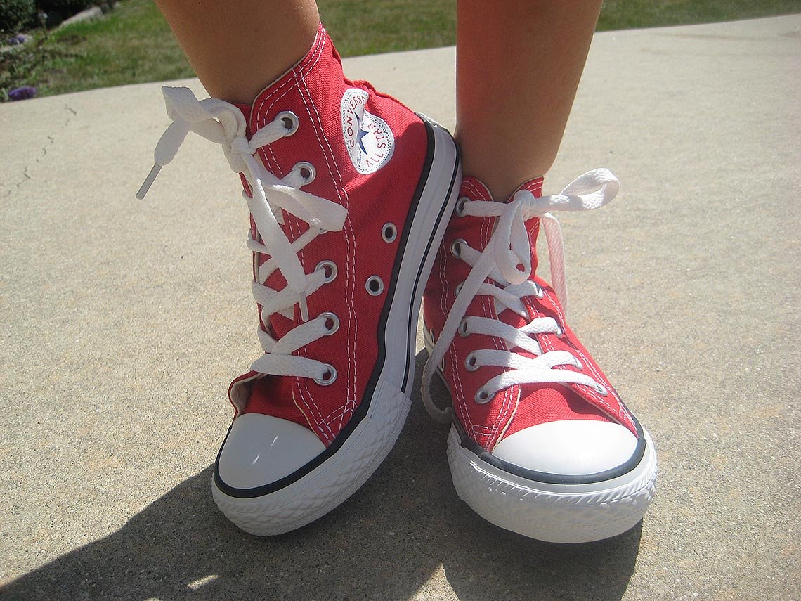 Converse Chuck Taylor Red on feet