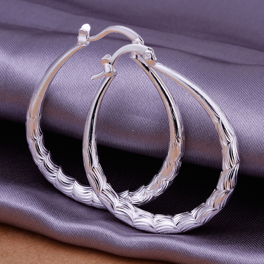 Сережки кольца серебряные
