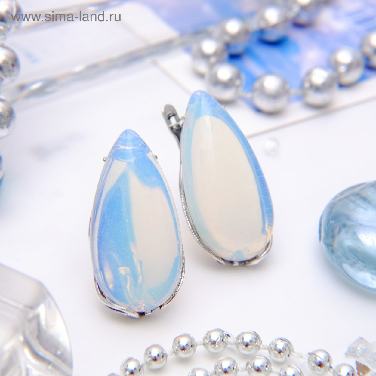 Серьги капельки лунный камень